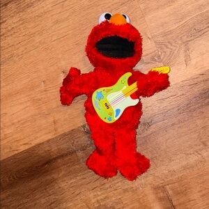 Red Plush Elmo Toy with Guitar